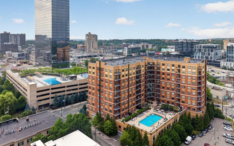 Exterior view of building and courtyard showing pool