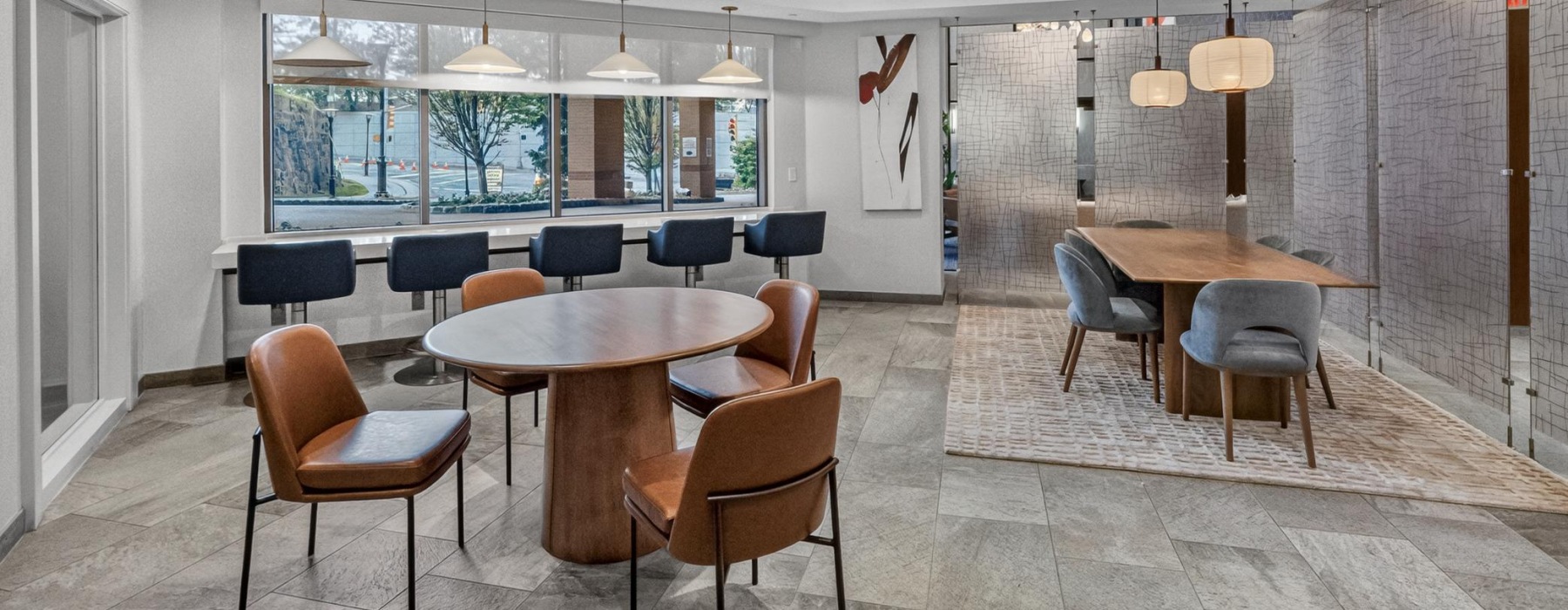 a room with multiple seating areas