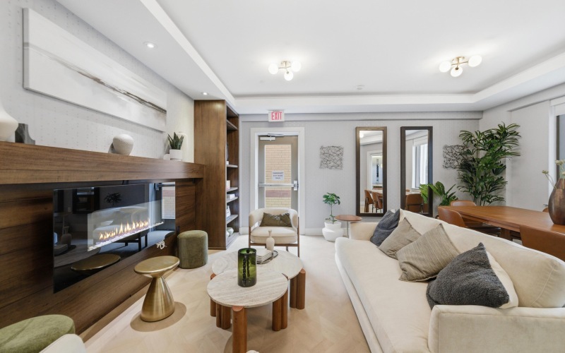 A resident library showing lounge area with firepit 