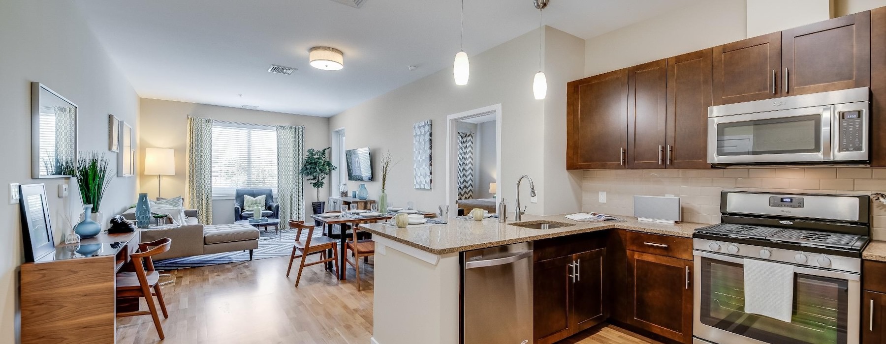a kitchen with wooden floors
