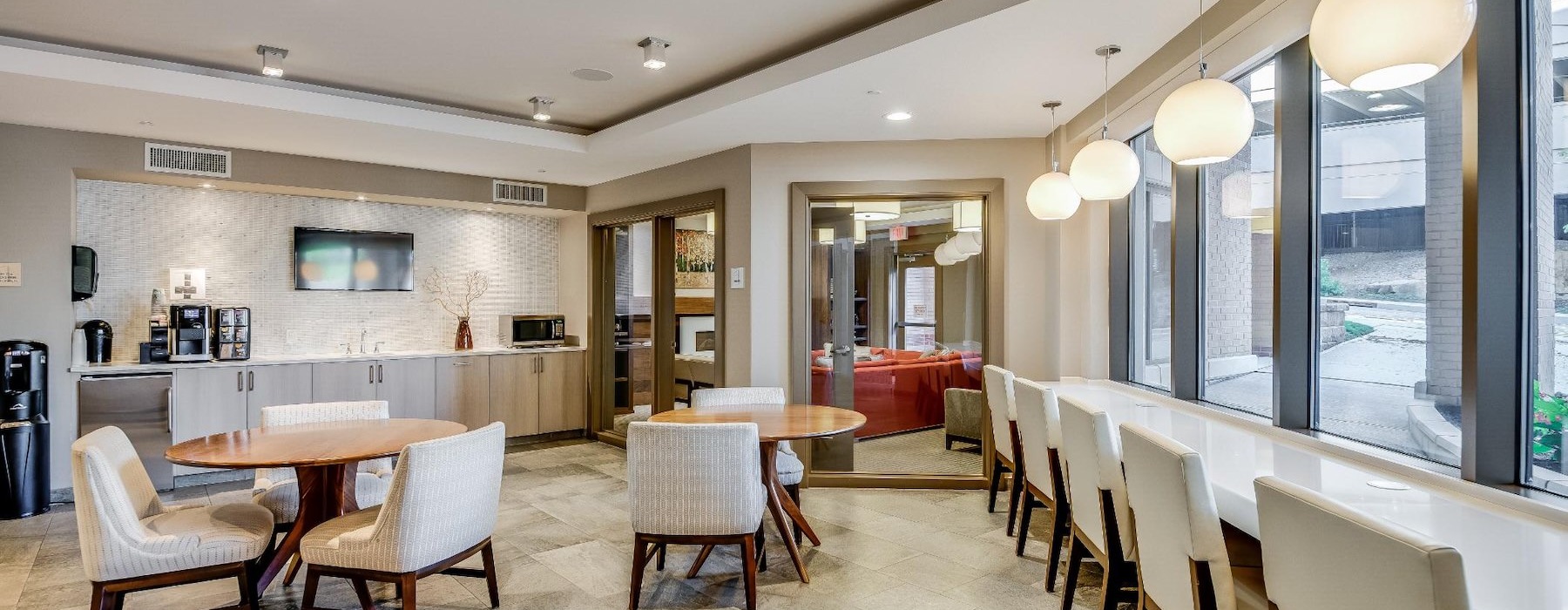 a community kitchen with tables and chairs
