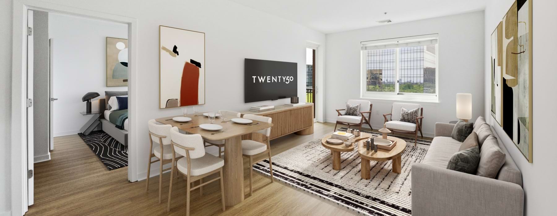 Living room with dining set up, sofa area, TV, and looking into bedroom