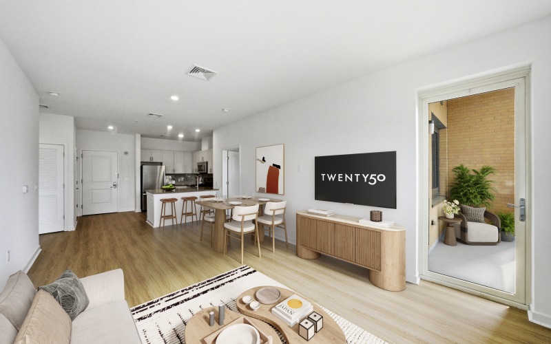 Living room showing balcony and looking into the kitchen